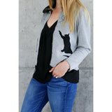 You are pert and pretty in a charming vintage-inspired cardigan. Smooth 100% cotton intarsia embellishes this soft knit, featuring two playful cats reaching for an embroidered butterfly. Accentuated by a detachable FAKE fur trim collar, appliqued elbow patches and delicate pearl buttons, this retro look inspires.  Heather grey with black pattern and collar.  100% cotton Detachable fur collar buttons on/off Appliquéd elbow patches Hand wash or machine wash gentle cycle Front button closure