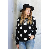 Our best seller is back!  Cats, not dots, adorn our pullover sweater in a soft, fine gauge cotton.  Jewel neckline and long sleeves complete the look.  Mid-hip length.  Choose:    Black ground with Off-white cats or  Off-white ground with black cats.  100% softest cotton Rib trims Fine gauge jacquard Machine wash cold, lay flat to dry.