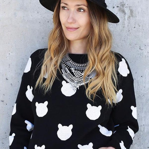 Our best seller is back!  Cats, not dots, adorn our pullover sweater in a soft, fine gauge cotton.  Jewel neckline and long sleeves complete the look.  Mid-hip length.  Choose:    Black ground with Off-white cats or  Off-white ground with black cats.  100% softest cotton Rib trims Fine gauge jacquard Machine wash cold, lay flat to dry.