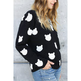 Our best seller is back!  Cats, not dots, adorn our pullover sweater in a soft, fine gauge cotton.  Jewel neckline and long sleeves complete the look.  Mid-hip length.  Choose:    Black ground with Off-white cats or  Off-white ground with black cats.  100% softest cotton Rib trims Fine gauge jacquard Machine wash cold, lay flat to dry.