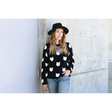 Our best seller is back!  Cats, not dots, adorn our pullover sweater in a soft, fine gauge cotton.  Jewel neckline and long sleeves complete the look.  Mid-hip length.  Choose:    Black ground with Off-white cats or  Off-white ground with black cats.  100% softest cotton Rib trims Fine gauge jacquard Machine wash cold, lay flat to dry.