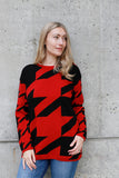 An on-trend Houndstooth pattern is featured in two different sizes on this cotton pullover tunic.  Details include long sleeves and a jewel neckline.    Off-White with black houndstooth  or  Dark Red with black houndstooth  100% softest cotton Rib trims Fine gauge jacquard Machine wash cold, lay flat to dry.  Ladies sweater