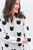 Our best seller is back!  Cats, not dots, adorn our pullover sweater in a soft, fine gauge cotton.  Jewel neckline and long sleeves complete the look.  Mid-hip length.  Choose:    Black ground with Off-white cats or  Off-white ground with black cats.  100% softest cotton Rib trims Fine gauge jacquard Machine wash cold, lay flat to dry.