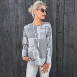 Sweater An architectural composition of frames and boxes is in the softest cotton yarn. Lightweight, tunic length (Medium is 27" long) crew neck pullover with side slits.  Long sleeves.  Multiple tones of soft heather grey.  Pattern is allover front, back and sleeves. Bracelet-length sleeves.  Machine wash cold, lay flat to dry.  framework. jacquard block pattern